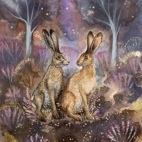 illustrations of bunnies in a magical background